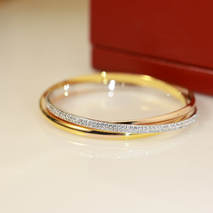 [Solara Jewelry ]ダイヤモンドが輝くマルチトーンスリーバンドツイストブレスレット