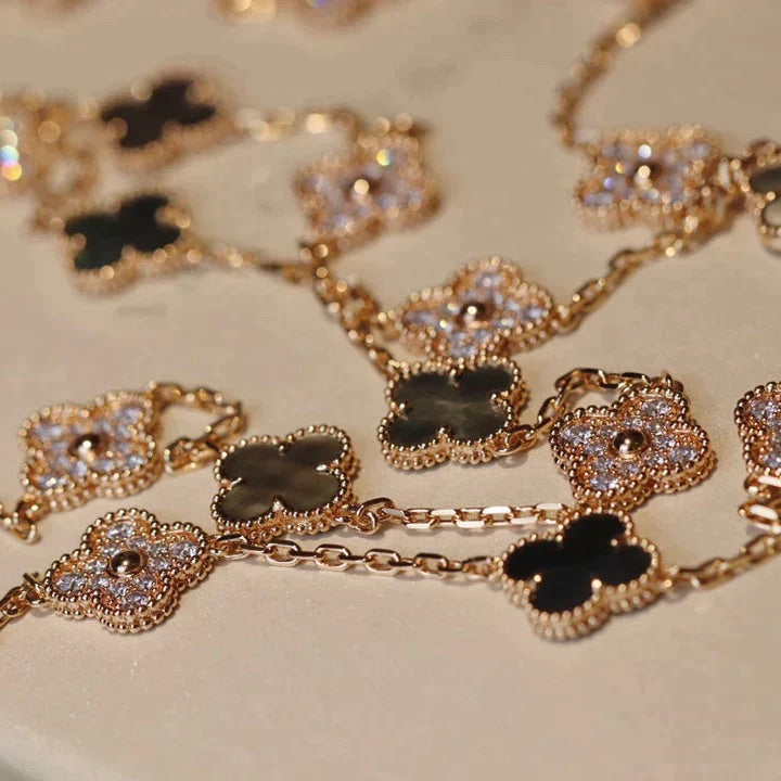 [Solara Jewelry ]KLEEBATT 20 MOTIVE DUNKELES PERLMUTT DIAMANT HALSKETTE