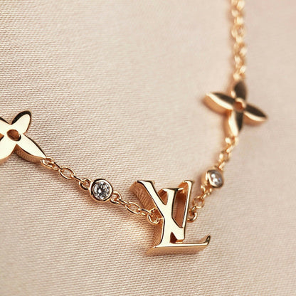 [Solara Jewelry ]STAR AND SUN 7 MOTIFS GOLD BRACELET
