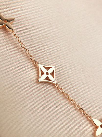 [Solara Jewelry ]STAR AND SUN 7 MOTIFS GOLD BRACELET
