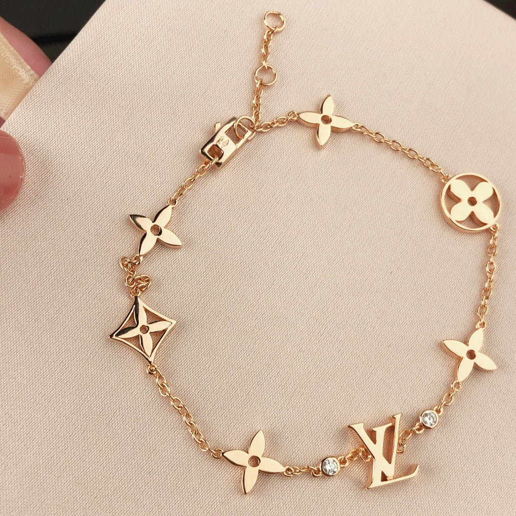 [Solara Jewelry ]STAR AND SUN 7 MOTIFS GOLD BRACELET
