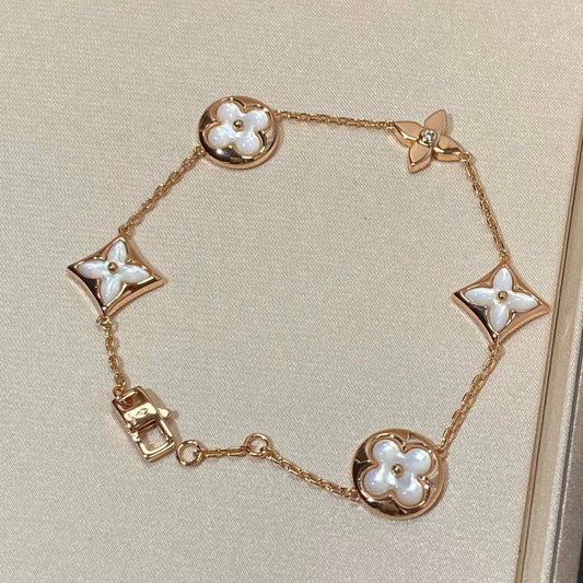 Solara Jewelry Sternen- und Sonnen-Armband mit 5 Motiven aus Perlmutt in Roségold