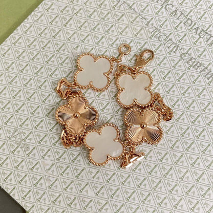 [Solara Jewelry ]KLEEBRACHLETT 5 MOTIV WEISSE PERLMUTT ROSEGOLD
