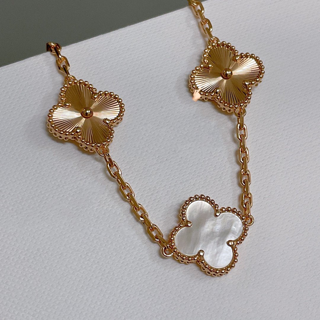 [Solara Jewelry ]KLEEBRACHLETT 5 MOTIV WEISSE PERLMUTT ROSEGOLD