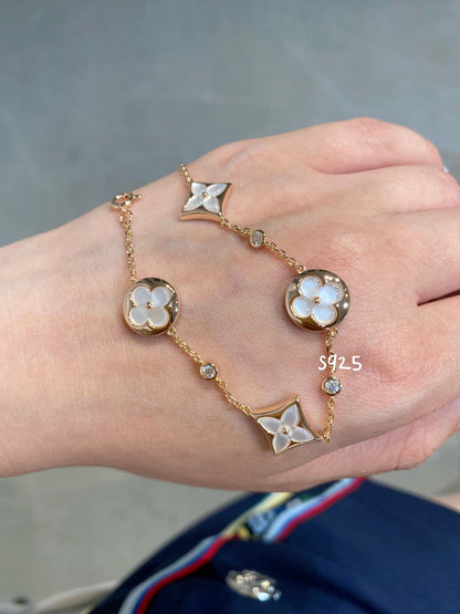 [Solara Jewelry ]STAR AND SUN 4 MOTIF WHITE MOP PINK GOLD BRACELET