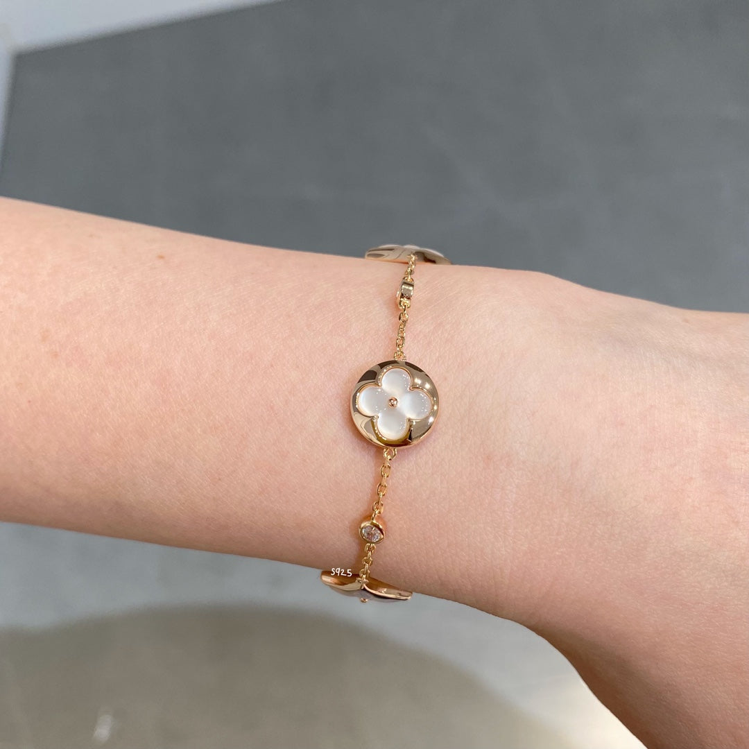 [Solara Jewelry ]STAR AND SUN 4 MOTIF WHITE MOP PINK GOLD BRACELET