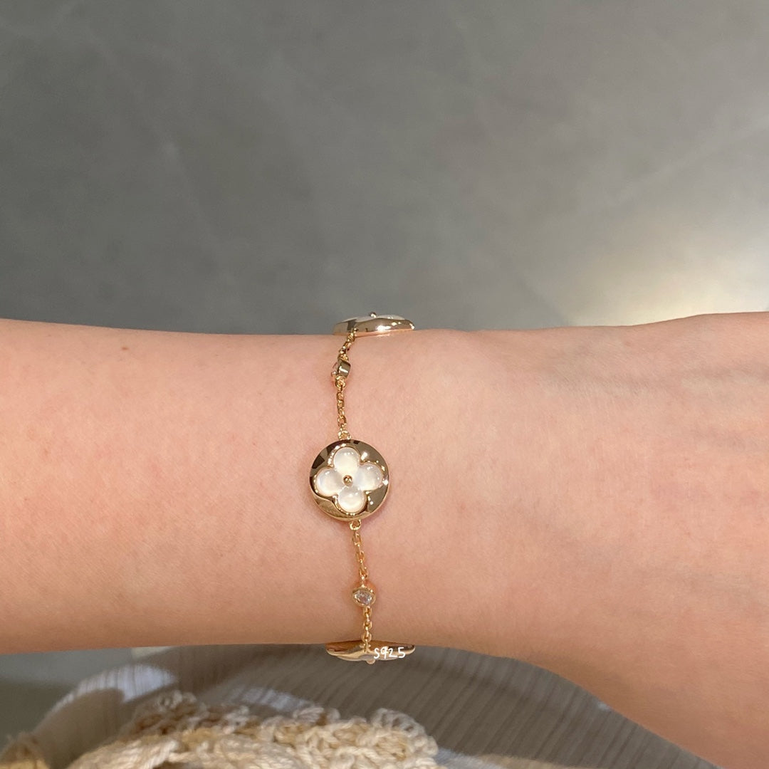 [Solara Jewelry ]STAR AND SUN 4 MOTIF WHITE MOP PINK GOLD BRACELET