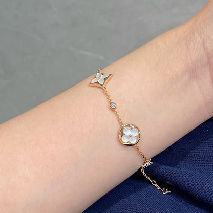 [Solara Jewelry ]STAR AND SUN 4 MOTIF WHITE MOP PINK GOLD BRACELET