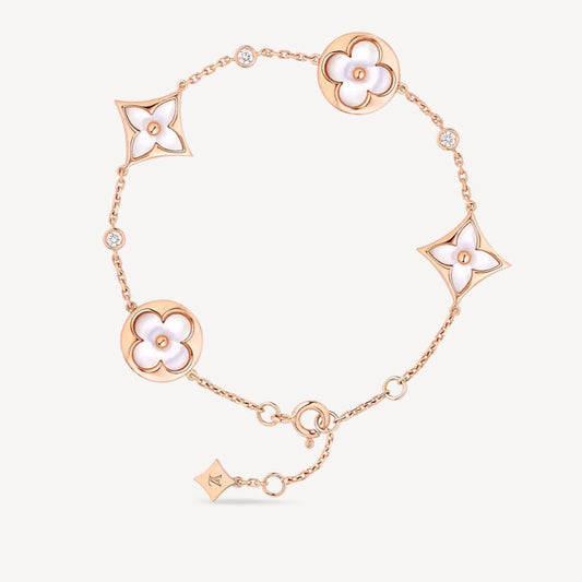 [Solara Jewelry ]STAR AND SUN 4 MOTIF WHITE MOP PINK GOLD BRACELET