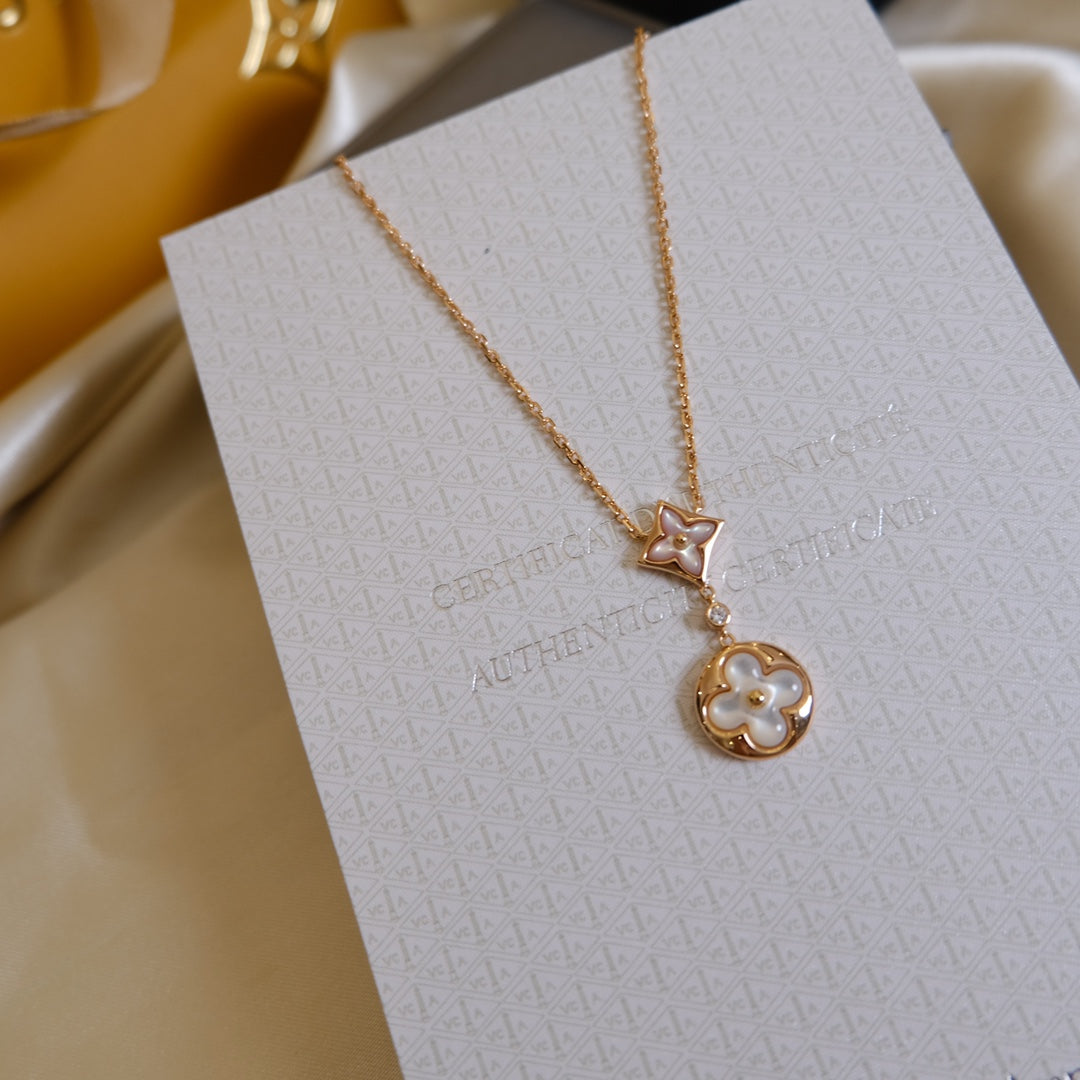 [Solara Jewelry ]STAR AND SUN WHITE MOP 2 MOTIF PINK GOLD NECKLACE