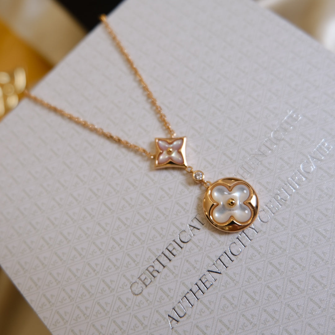 [Solara Jewelry ]STAR AND SUN WHITE MOP 2 MOTIF PINK GOLD NECKLACE
