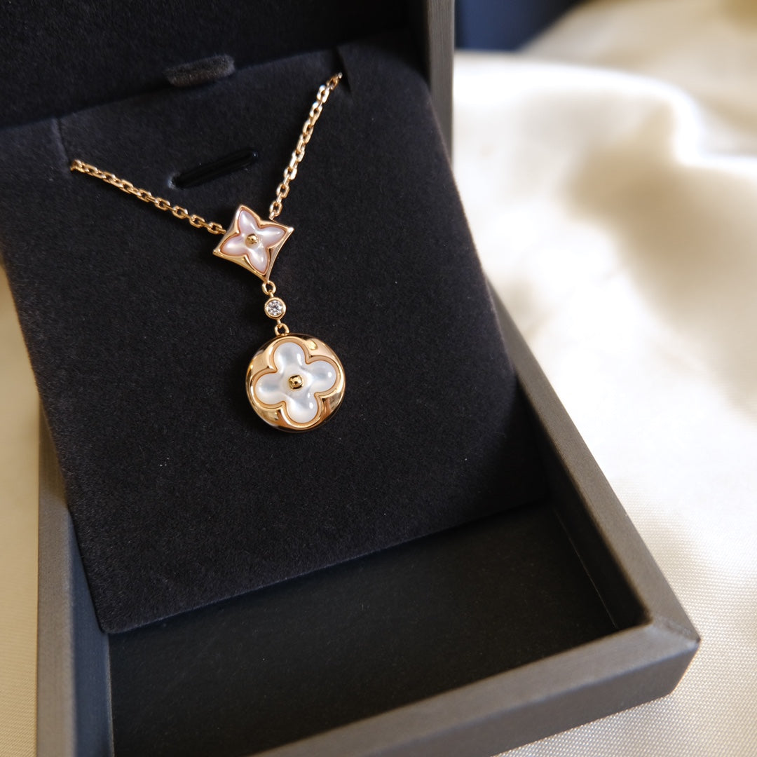 [Solara Jewelry ]STAR AND SUN WHITE MOP 2 MOTIF PINK GOLD NECKLACE