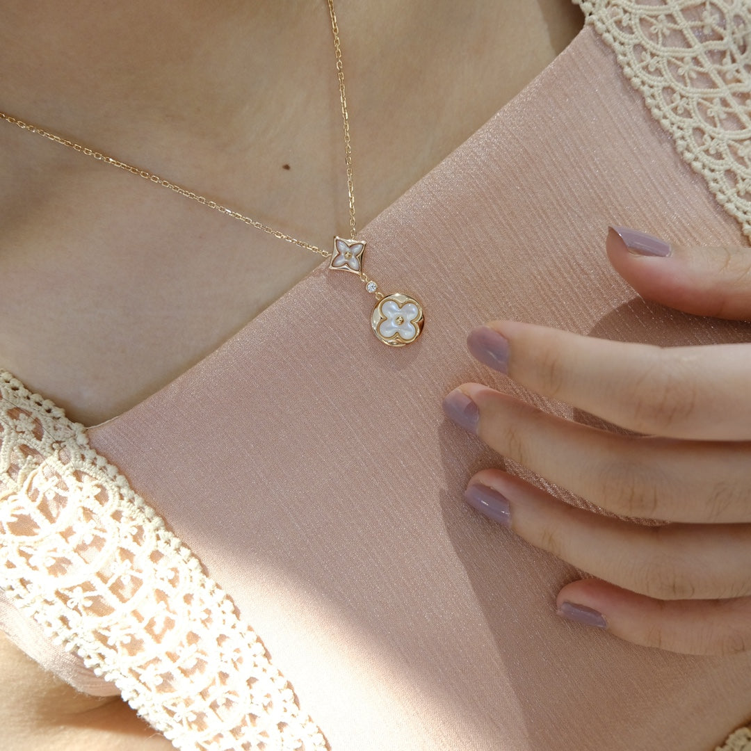 [Solara Jewelry ]STAR AND SUN WHITE MOP 2 MOTIF PINK GOLD NECKLACE
