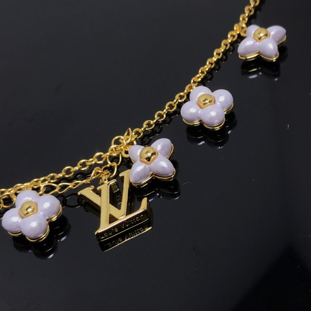 [Solara Jewelry ]ロゴ 6モチーフ スターアンドサン ゴールドブレスレット