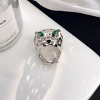 [Solara Jewelry ]CT Eleganter durchbrochener Pantherkopfring mit Smaragd