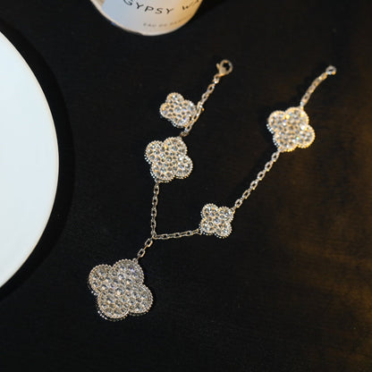 [Solara Jewelry ]KLEEBRACHTARMBAND 5 MOTIV SILBER DIAMANT PAVÉ