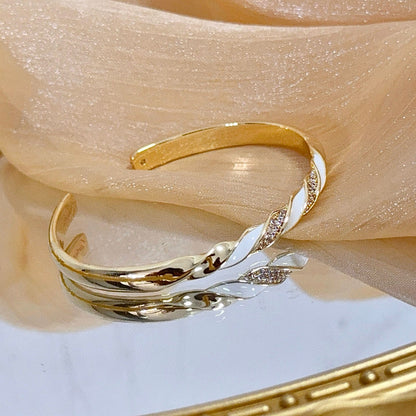 [Spira Jewelry]TWISTED PAVE OPEN BANGLE