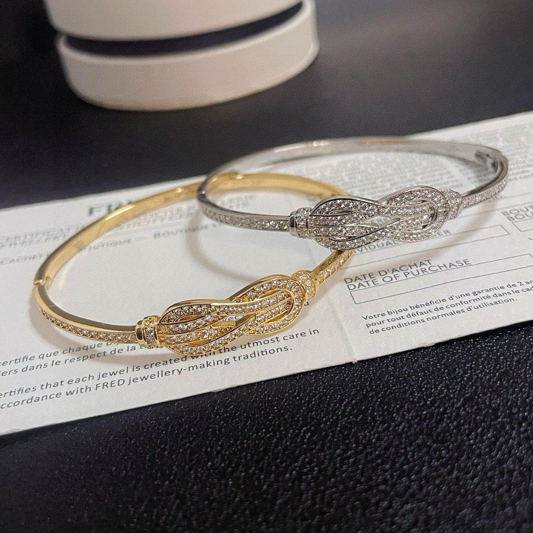 [Solara Jewelry ]FORCE Ewiger Knoten Armband, komplett mit Kristallen besetzt
