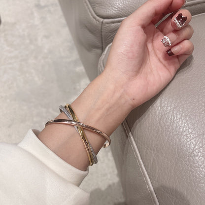 [Solara Jewelry ]ダイヤモンドが輝くマルチトーンスリーバンドツイストブレスレット