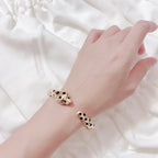 [Spira Jewelry]PAVE SPOTTED PANTHER HEAD BANGLE