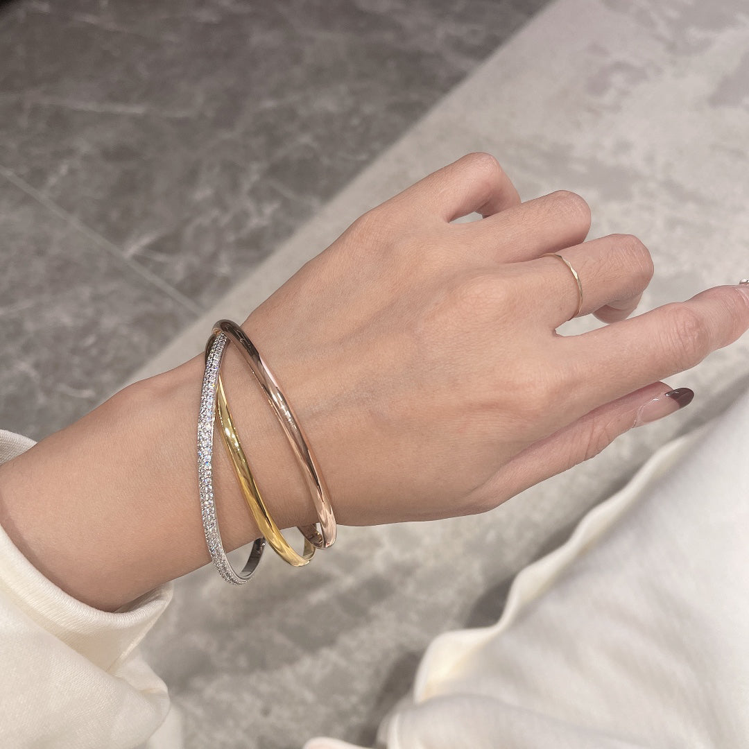 [Solara Jewelry ]ダイヤモンドが輝くマルチトーンスリーバンドツイストブレスレット