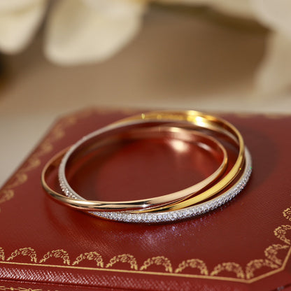 [Solara Jewelry ]ダイヤモンドが輝くマルチトーンスリーバンドツイストブレスレット