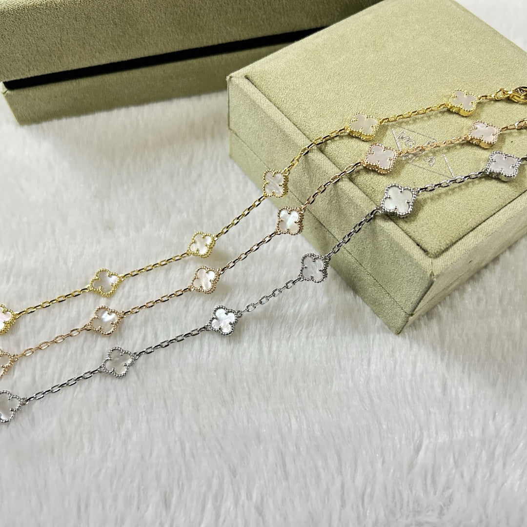 [Solara Jewelry ]KLEEBÜTTCHEN-ARMBAND MIT 6 MOTIVEN, WEISSES PERLMUTT