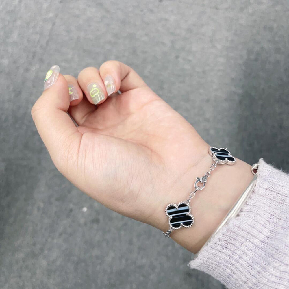 [Solara Jewelry ]KLEEBÜTE 5 MOTIV GEÄDERTER ONYX-ARMBAND SILBER