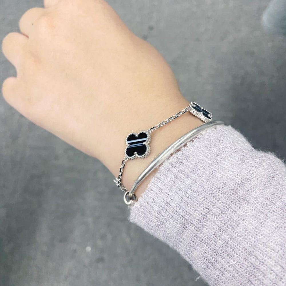 [Solara Jewelry ]KLEEBÜTE 5 MOTIV GEÄDERTER ONYX-ARMBAND SILBER