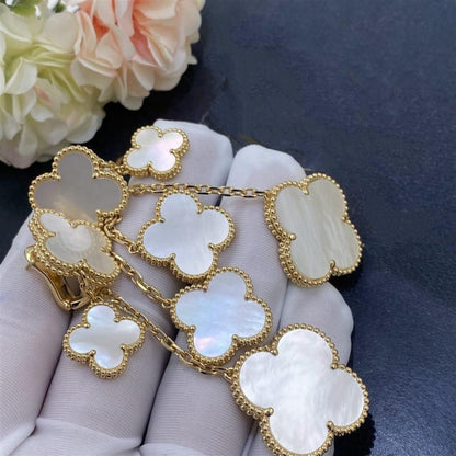 [Solara Jewelry ]KLEEBATT OHRRINGE WEISSES PERLMUTT 4 MOTIVE GOLD