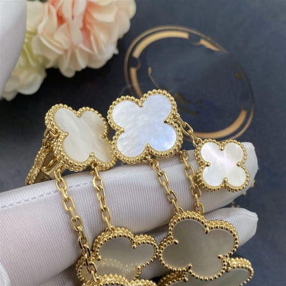 [Solara Jewelry ]KLEEBATT OHRRINGE WEISSES PERLMUTT 4 MOTIVE GOLD